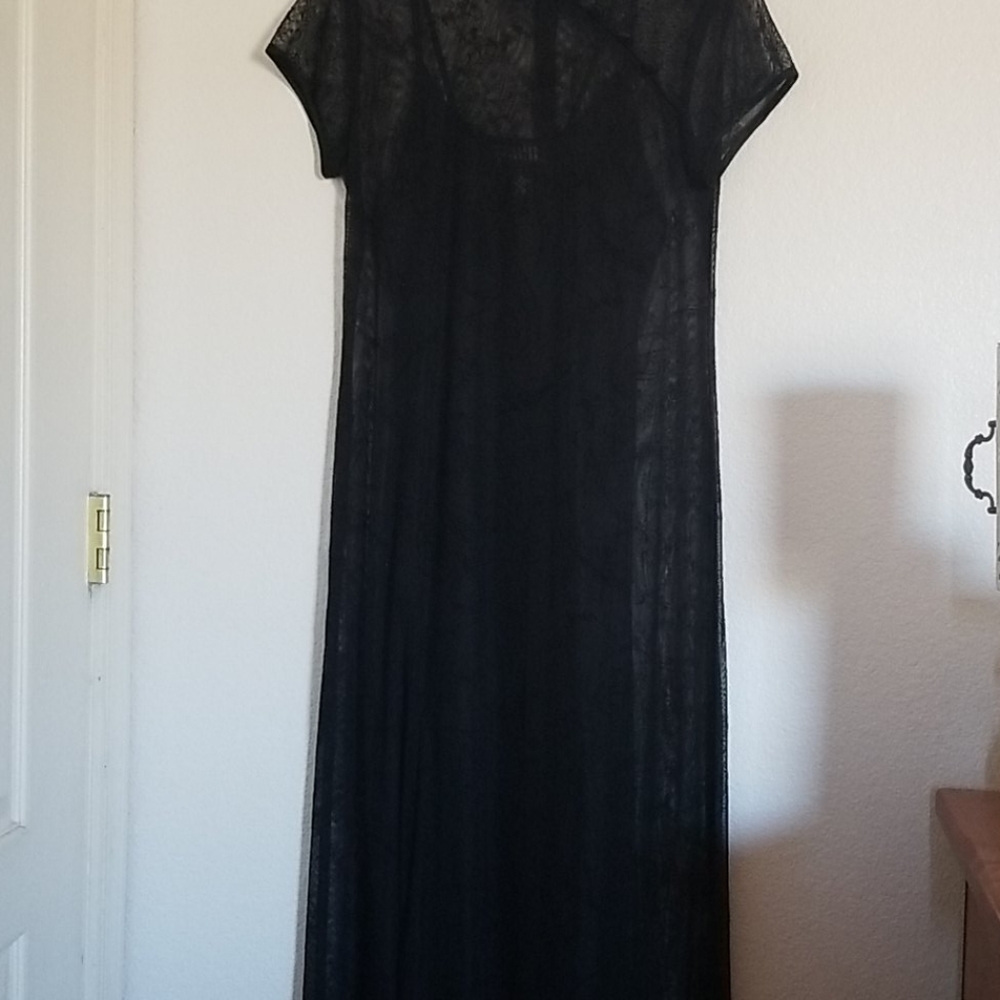 Sheer black dress with a black slip dress